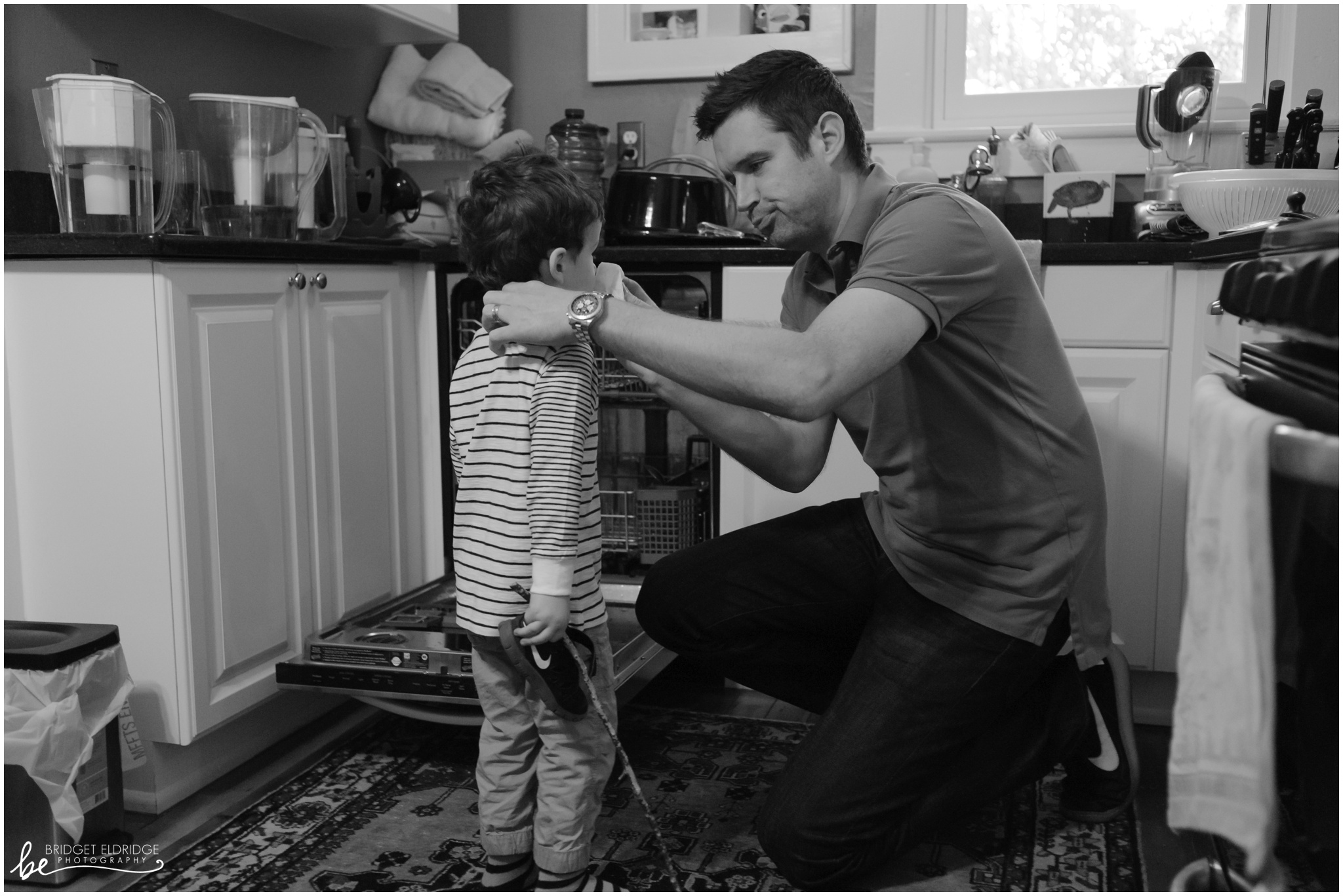 dc-day-the-life-family-photography-rowands-010009.jpg father wipes sons face